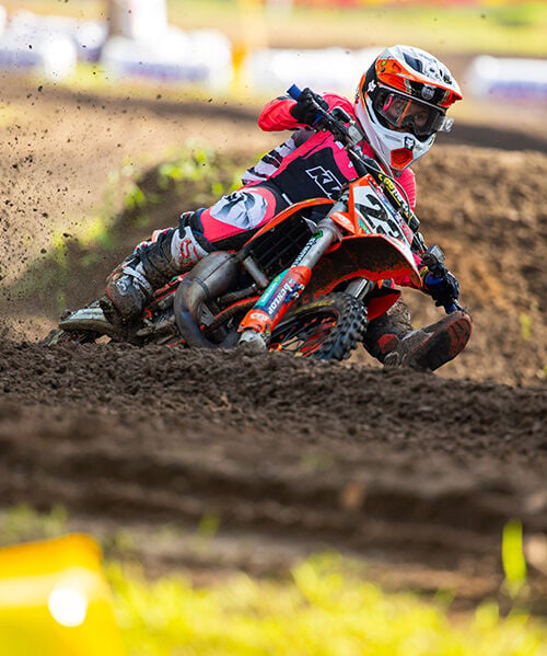 MX rider on red bike